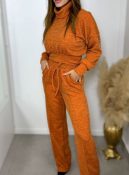 conjunto feminino em tricot com gola alta